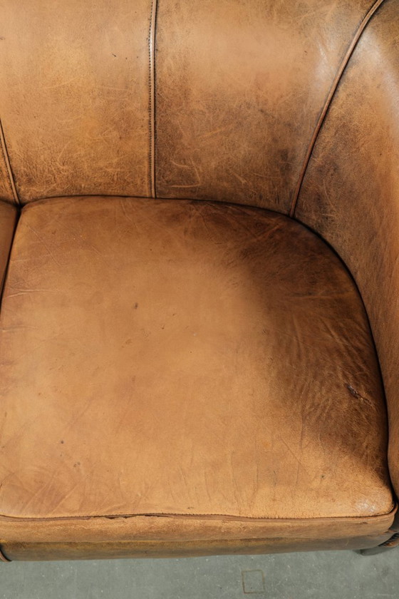 Image 1 of Karaktervolle schapenleren 2 zits bank met een mooie vintage look