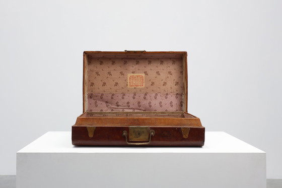 Image 1 of Vintage brown leather suitcase with copper details, China 1900s