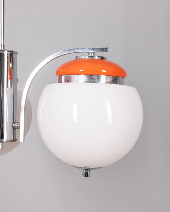 Image 1 of Vintage kroonluchter 70s Oranje Metaal en Glas Italiaans Ontwerp