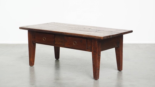 Practical antique French coffee table with striking colors