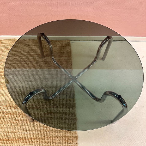 Image 1 of Curved tubular chrome coffee table with round glass top