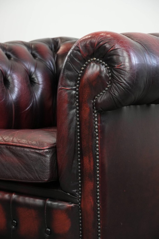 Image 1 of Englischer Chesterfield-Ledersessel auf Rollen, verziert mit Ziernieten