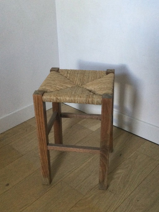 Brutalist stool with a woven seat