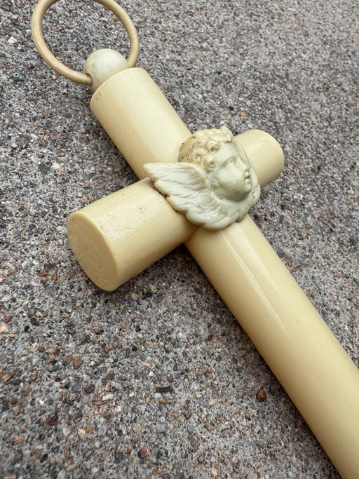 Antiek celluloid wiegkruis