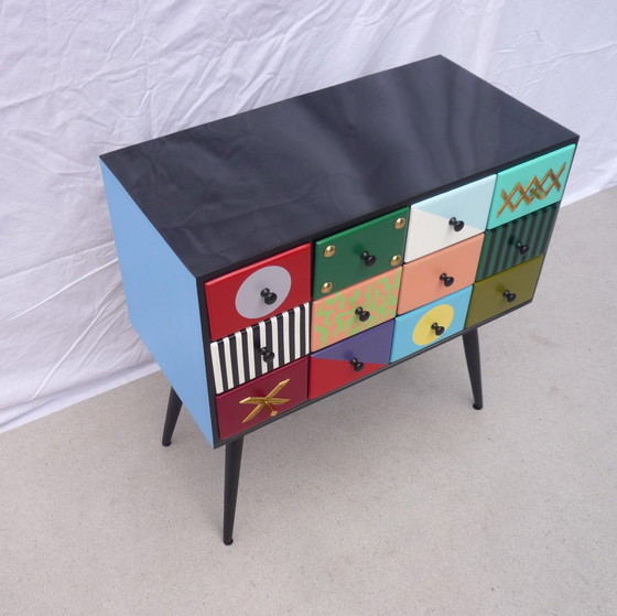 Image 1 of Minikast met 12 laden