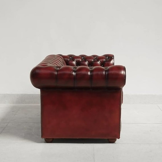 Image 1 of Vintage Chesterfield fauteuil in bordeauxrood leer - teakhouten frame, jaren 60