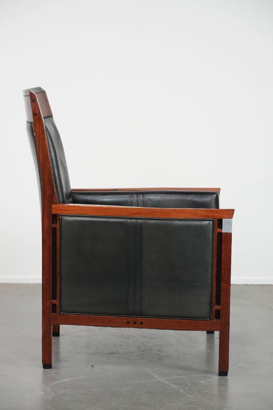 Image 1 of Black cowhide and wooden Art Deco design armchair by Schuitema from the Decoforma series with decorative cushion