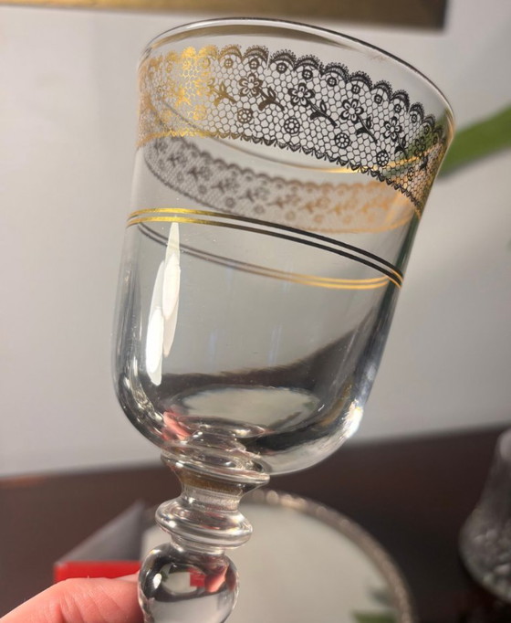Image 1 of application Baccarat en or sur verre cristal