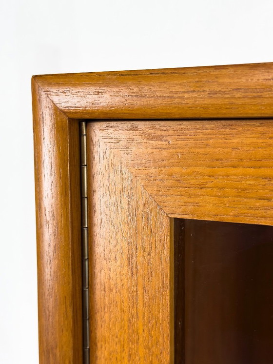 Image 1 of Mobiletto in teak con ante in vetro di WK Möbel, anni '70