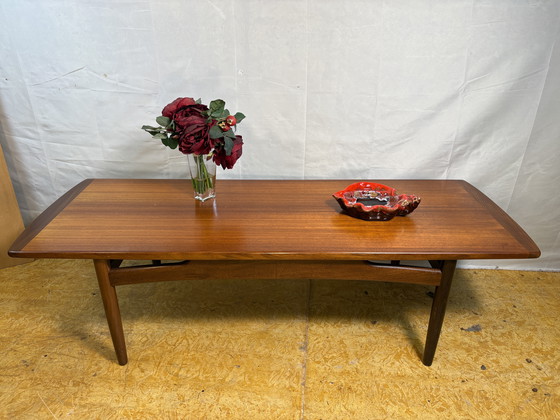 Image 1 of G-Plan Brasilia Coffee Table in Teak & Afromosia 1960s  This elegant mid-century coffee table — part of the celebrated “Brasilia