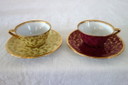 6 tazze e piattini vintage di Limoges con decorazioni floreali e dorate.