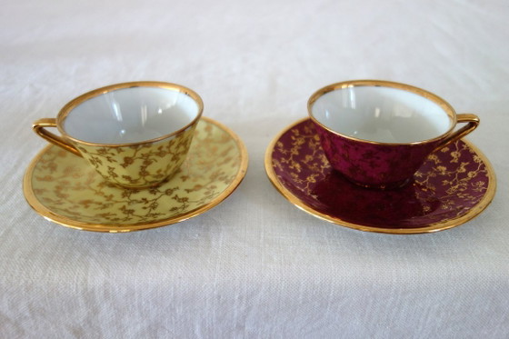 Image 1 of 6 vintage Limoges kopjes en schotels met bloem- en gouddecoratie.