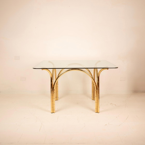 Table de salle à manger italienne méditerranéenne en acier plaqué laiton effet bambou et plateau en verre (photo 9 of 21)