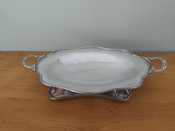 Image 1 of Centrotavola antico in metallo argentato