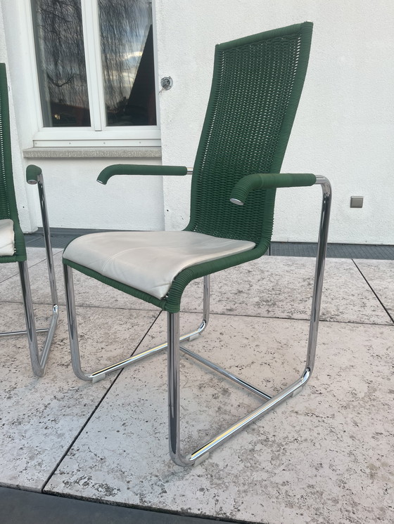 Image 1 of Tecta cantilever chair in fresh green with armrests and white seat cushions, design by Axel Buchhäuser