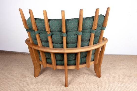 Image 1 of Gran sillón francés de roble macizo diseñado por Guillermo y Chambron para Your Home en 1960.