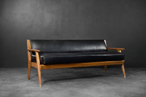 Divano vintage in rovere e pelle nera, stile tedesco moderno di metà secolo, anni '60