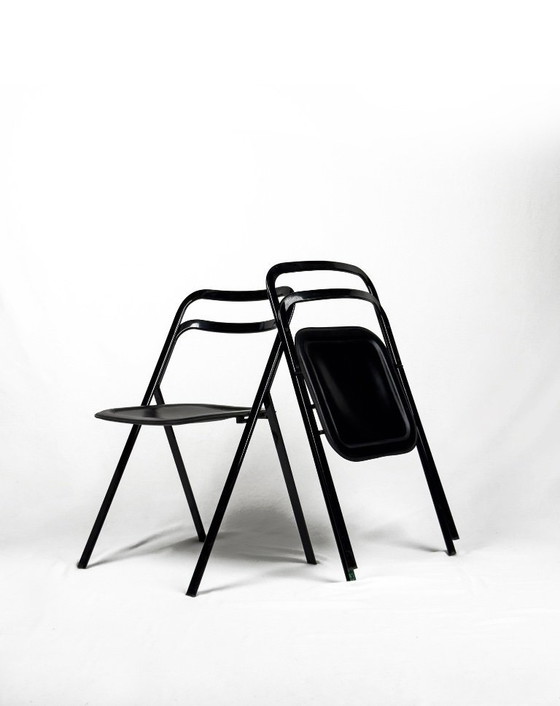 Image 1 of 4x Black metal and leather “Clio” folding chairs by Giorgio Cattelan
