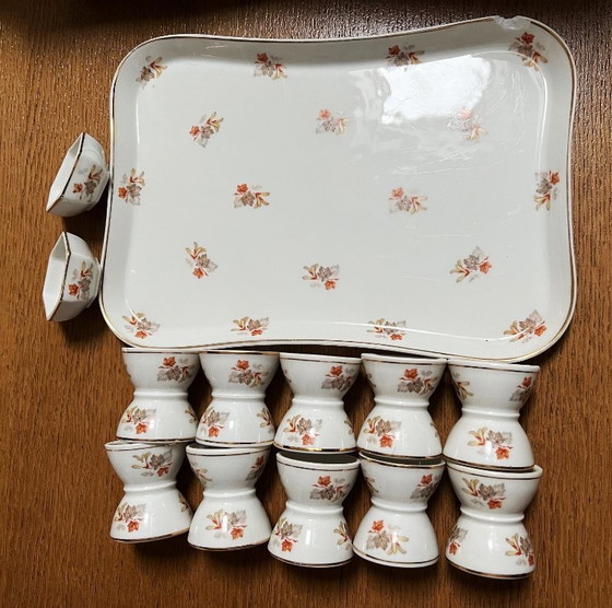 Image 1 of Set di 10 portauova diabolo, 2 saliere e un vassoio, porcellana Haviland e Le Tanneur