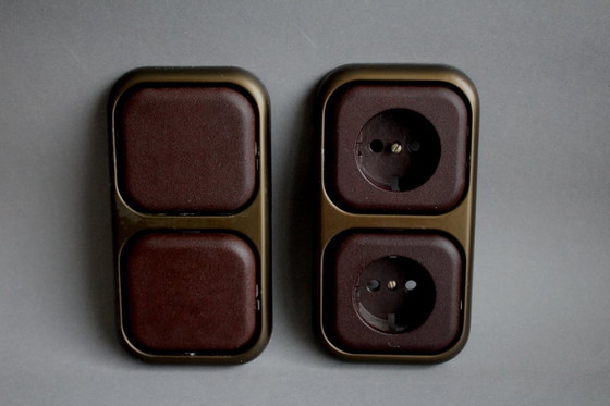 Image 1 of Large collection of vintage brown sockets and light switches with antique gold frames, 1960s/70s