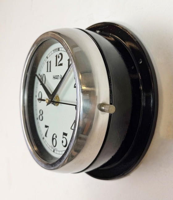 Image 1 of Vintage zwarte Hanil scheepswandklok, jaren 80