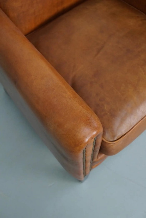 Image 1 of Vintage Nederlandse clubfauteuil van cognackleurig leer
