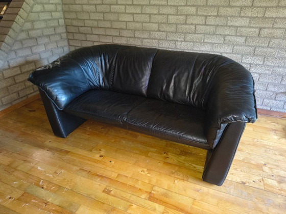 Image 1 of Two identical, black, leather Leolux sofas