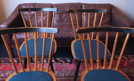 Set van 4 eetkamerstoelen in mid-century stijl met uitlopende poten en marineblauwe zittingen. – Textile (photo 2 of 11)