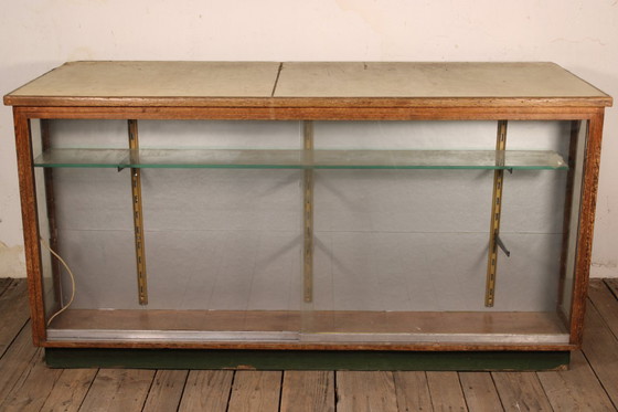 Image 1 of Antique industrial apothecary cabinet • Vintage wood and metal drawer cabinet with many compartments