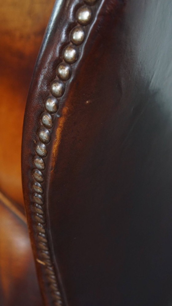 Image 1 of Donkere Engelse stijl schapenleren oorfauteuil