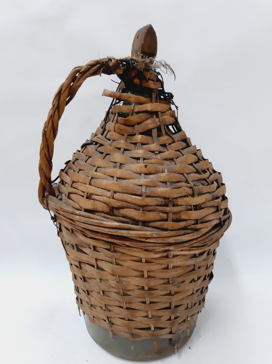 Image 1 of Dame-jeanne ancienne en osier et verre