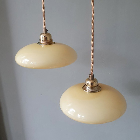 Image 1 of Vintage French pendant lamp set - of pastel yellow opaline glass.