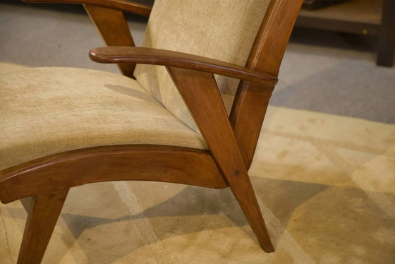 Scandinavian armchair and two 1960s ottomans. (photo 9 of 16)