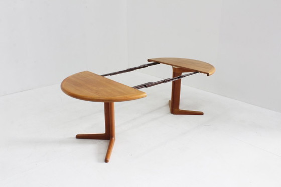 Image 1 of Vintage Danish round extendable teak dining table from the 1960s