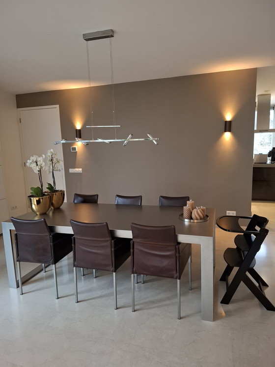 Image 1 of Mesa de comedor de diseño de acero inoxidable