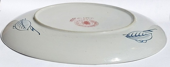 Image 1 of Large Chinese decorative plate with traditional Middle Eastern and Islamic patterns.