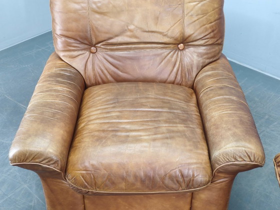 Image 1 of Een paar Arcon Italia loungefauteuils van cognacbruin buffelleer.