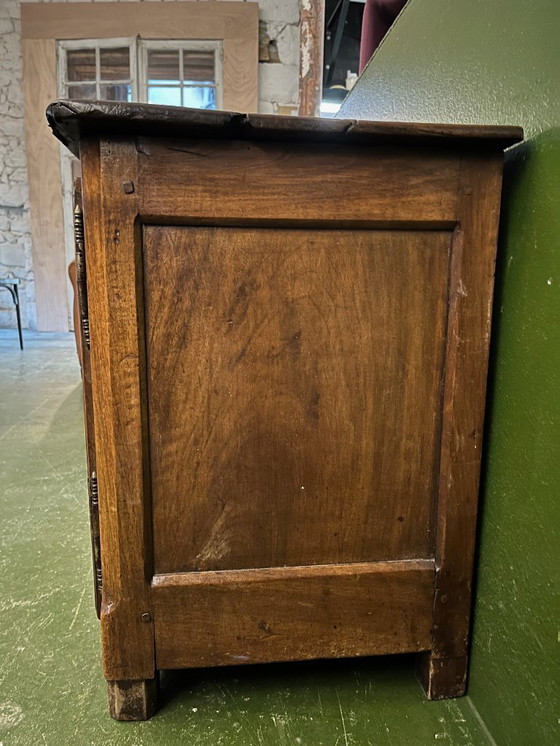 Image 1 of A very small rustic walnut sideboard