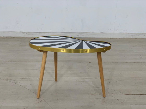 Image 1 of Vintage niervormige salontafel Bloemetjesbank