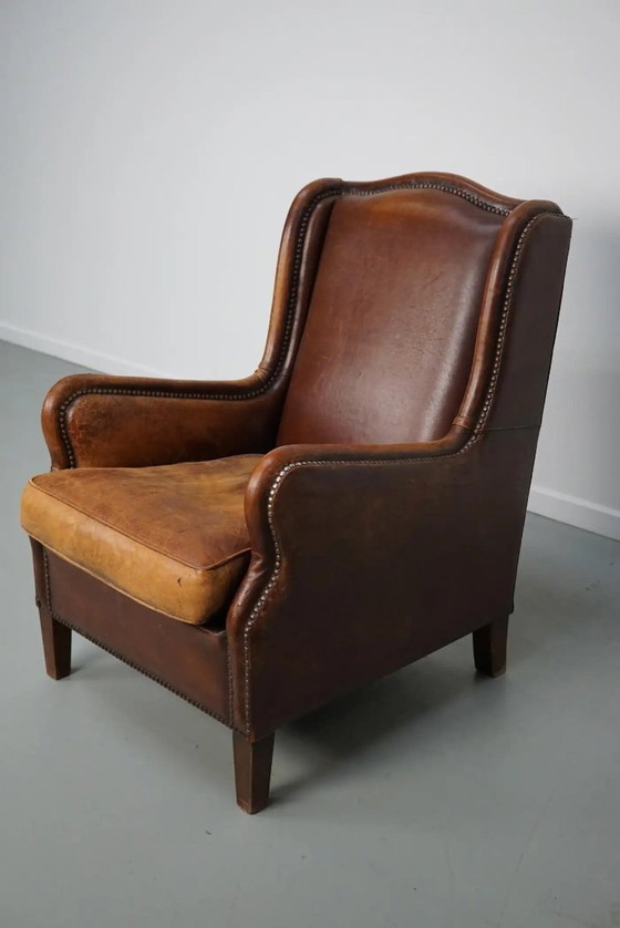 Image 1 of Vintage Nederlandse clubfauteuil van cognackleurig leer