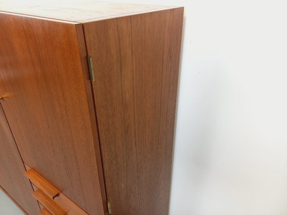 Image 1 of Tall, modernist, vintage Scandinavian sideboard in teak and black metal from the 1960s