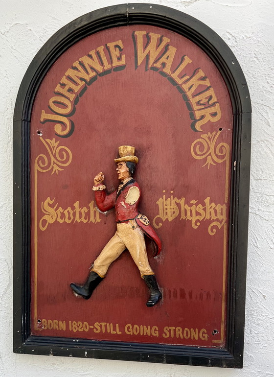 Image 1 of JOHNNIE WALKER – Original vintage wooden plaque with 3D relief figure “The Striding Man” (ca. 1970s)
