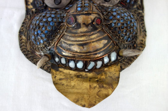 Image 1 of Maschera rituale vintage in ottone sbalzato Nepal/Tibet
