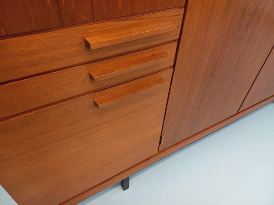 Image 1 of Tall, modernist, vintage Scandinavian sideboard in teak and black metal from the 1960s