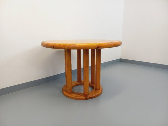 Image 1 of Vintage Scandinavian round dining table by Rainer Daumiller in pine from the 1960s/70s with extensions