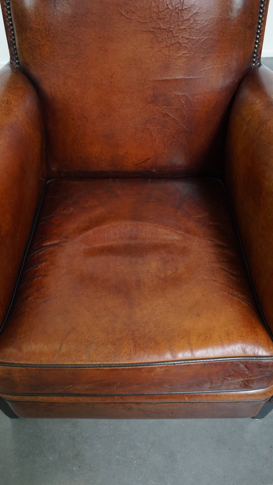 Image 1 of Schapenleren design fauteuil/ armchair in een cognac kleur
