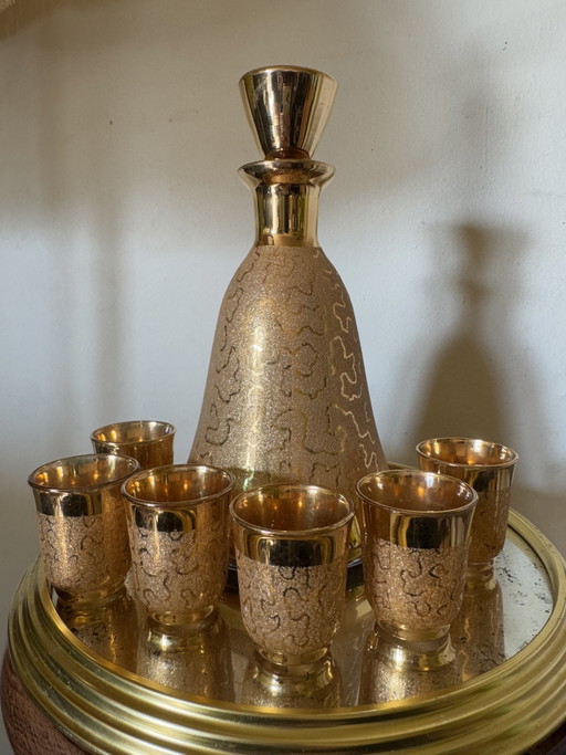 Set di caraffa e bicchieri da liquore in oro anni '60