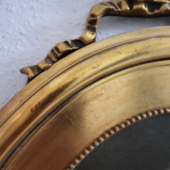 Image 1 of Large oval gold frame with bow, portrait, vintage