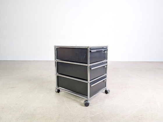 Image 1 of 6 ruote per mobile da ufficio USM Haller con serratura blu scuro