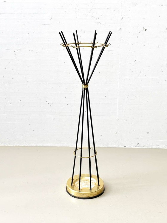 Image 1 of Armoire pivotante italienne avec éléments en laiton, Italie des années 1950